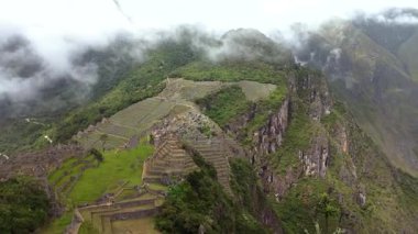 Machu Picchu ancient city view from Huchu'y Picchu in cloudy weather