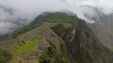 Machu Picchu ancient city view from Huchu'y Picchu in cloudy weather
