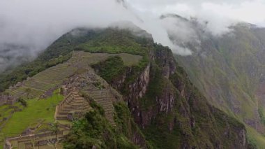 Machu Picchu ancient city view from Huchu'y Picchu in cloudy weather