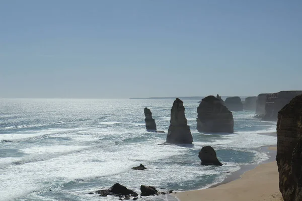 12 apostles in Victoria in Australia. Rocks in turquoise ocean and cliffs.