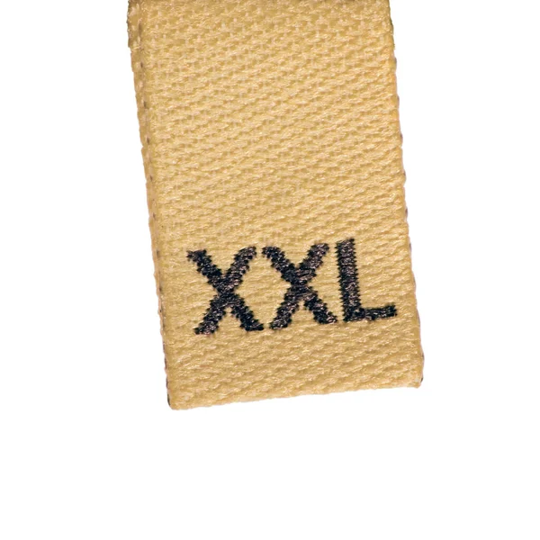 Xxl Storlek Beige Vävd Tyg Kläder Etikett Plagg Tagg Brun Royaltyfria Stockbilder