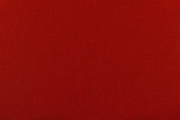 自然な明るいカーマインの赤い繊維のリネンの布の本の結合のテクスチャ パターン 大きい詳細な横のマクロの閉鎖 テクスチャーされたヴィンテージの生地の重複のキャンバスの背景の空白のコピー スペース ストック写真