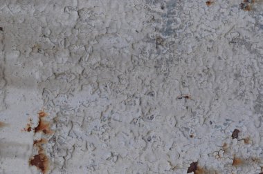 Eski doğal pastel mavisi soluk yaban mersini boyanmış paslı demir metal plaka arka plan dokusu, yatay yaşlanmış yıpranmış eski düz çizik sade boya deseni, grunge pas fotokopi uzay makrosu yakın çekim, büyük detaylı desenli kirli ceket, harap olmuş.