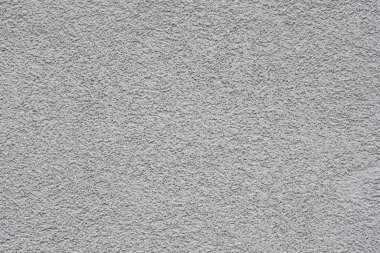 Açık gri bir binanın dış duvarının ayrıntıları 