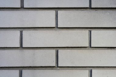 Detail of a decorative white brick wall - background wallpaper