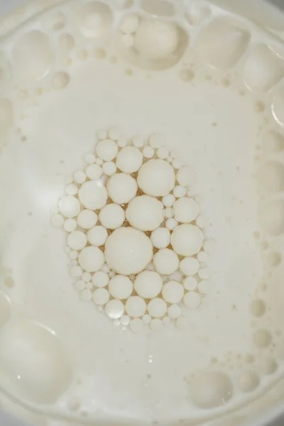 Detail of soy milk and oil mixture surface