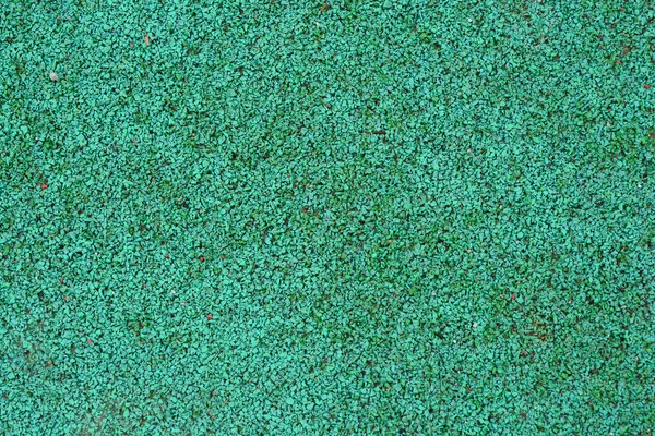 Detail Der Oberfläche Des Grünen Gummispielplatzes — Stockfoto