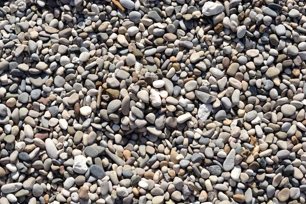 Detail of a ground covered with gray pebbles