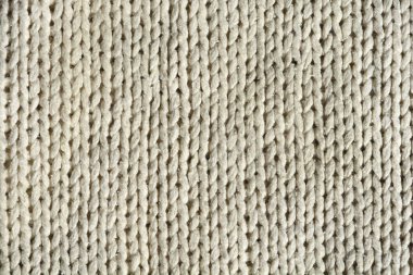 Örülmüş beyaz yün kumaşın ayrıntıları