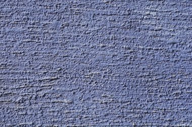 Koyu mavi binanın dış duvarının ayrıntıları.