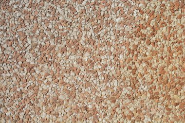 Küçük çakıl taşlarıyla yapılmış dış duvar yüzeyinin ayrıntıları