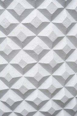 Beyaz desenli çimento yüzeyi çok sayıda yükseltilmiş çokgen parçasına bölünmüş - çiçek saksısı ayrıntıları