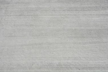 İnce yatay çizgileri olan gri beton yüzey