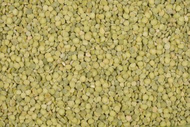 Çerçeveyi dolduran kurumuş yeşil bezelye yığınının yakın çekim, tepeden aşağı görüntüsü