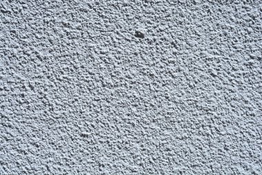 Kaba, kumlu bir cephenin ya da gri renkli bir duvarın yakın çekim dokusu