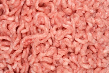 Çiğ domuz eti ve sığır eti yakın plan, görünür bir doku ve soluk pembe kolo