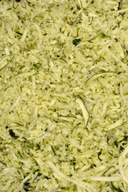 Ayrıntılı, tam kare rendelenmiş kabak portresi. Dokusunu ve açık yeşil rengini gösteriyor.