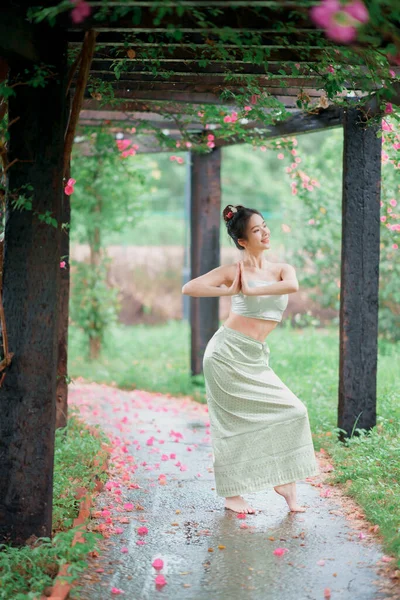 stock image Young woman in traditional Chinese costume dancing