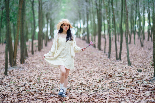 Portrait of romantic girl in the woods