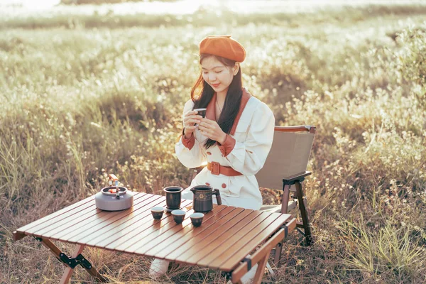 Asian girls make tea in the suburbs