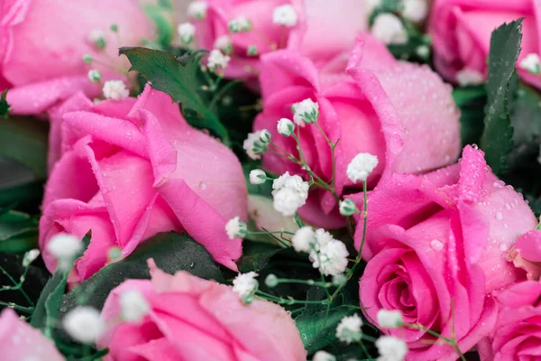 Bunch of pink roses in a florist shop