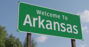 Arkansas 'a hoş geldiniz. Mavi Gök ve Bulutlara Karşı Yeşil Yol İşareti..