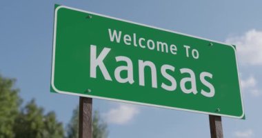 Mavi Gök ve Bulutlara Karşı Kansas Yeşil Yol Tabelasına Hoş Geldiniz.