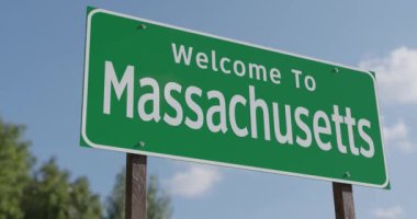 Massachusetts 'e Hoş Geldiniz Mavi Gök ve Bulutlara Karşı Yeşil Yol İşareti.