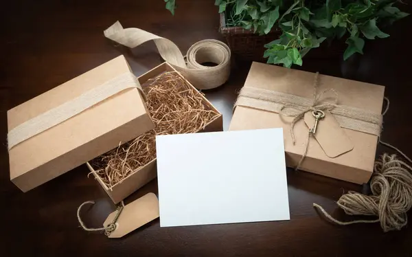 stock image Gift Packaging Boxes Mock Up with Jute String, Blank Card and Tags with Small Key on Wood Surface Ready For Your Branding.