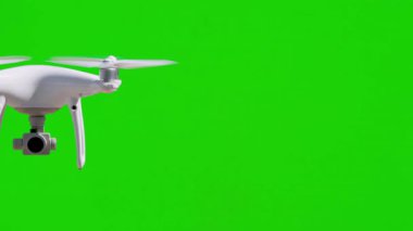 Gerçek UAV Quadcopter İnsansız Hava Aracı Yeşil Ekranın Önünde Yavaş Hareket Ediyor.