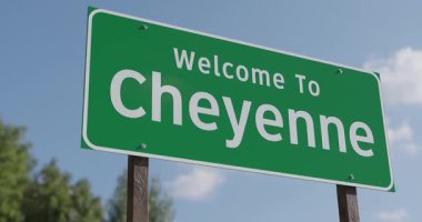 Cheyenne, Wyoming 'e Hoş Geldiniz Mavi Gök ve Bulutlara Karşı Yeşil Yol İşareti.