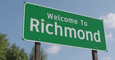 Richmond, Virginia 'ya Hoş Geldiniz Mavi Gök ve Bulutlara Karşı Yeşil Yol İşareti.