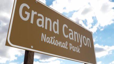 Büyük Kanyon Ulusal Parkı (Arizona) Mavi Gök ve Bulutlara Karşı Yol İşareti. ABD Ulusal Parklar Serisi 'nden biri.