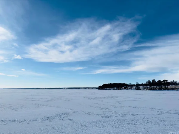 Winter landscape of frozen lake in north Sweden