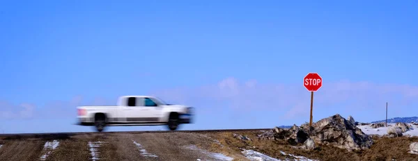 Stop Sign Road Winter Cars Trucks Speeding Blur — Stock Photo, Image