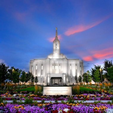 Pocatello Idaho LDS Mormon Latter-day Saint Temple with sky clouds flowers and trees