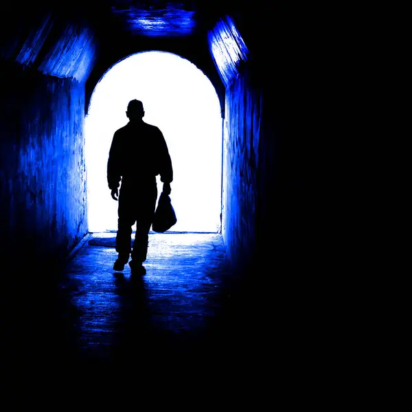 Person Walking Tunnel Light End Accomplishing Goal Leaving Darkness Stock Photo