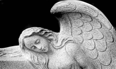 Sculpture of Angel with wings representing love faith and spiritual peace