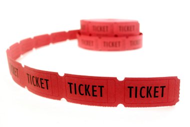 Closeup of Roll of red tickets connected together for admission or entry into an event performance or amusement clipart