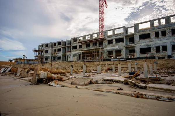 stock image Beach buildings seawalls damaged by heavy surf from Hurricane Nicole Daytona Beach Florida