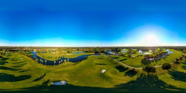 Plantation, FL, USA - January 6, 2022: Aerial 360 equirectangular photo of Lago Mar Country club golf course clipart