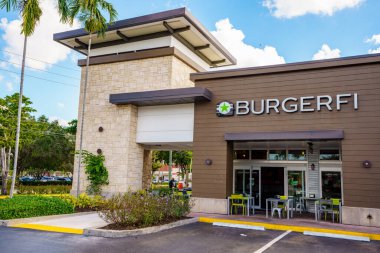 Davie, FL, USA - January 12, 2023: Photo of shops and restaurants at Tower Shops outdoor mall Davie Florida