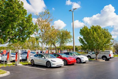 Davie, FL, USA - January 12, 2023: Tesla supercharger at Tower Shops Davie Florida