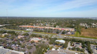 Far aerial video Sarasota Crossings shopping plaza