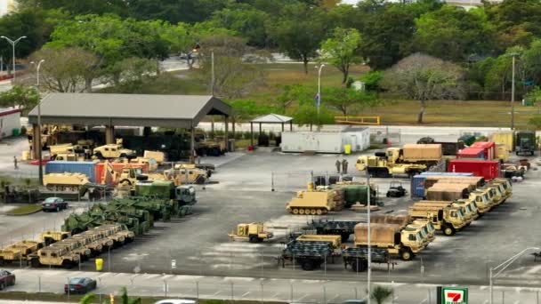 Aerial Telephoto Video Military Vehicles Parking Lot — Stock Video