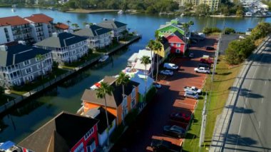Aerial pull out shot waterfront shops Sarasota Beach Florida on Stickney Point Road