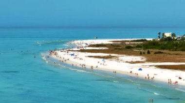 Aerial telephoto zoom shot Sarasota Beach Florida Gulf of Mexico coast 4k