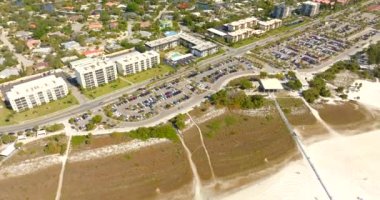 Aerial video free parking on Sarasota Beach Siesta Key fully occupied