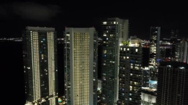 Aerial night scene Miami 4k circa 2023 highrise construction towers