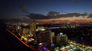 Aerial tour Miami night lights sunset video